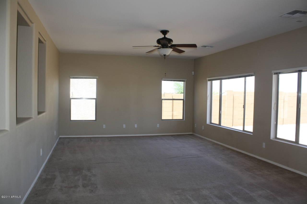 5114 West Apollo Road Laveen, AZ 85339 - Photo 5 of 17 a view of an empty room with a window
