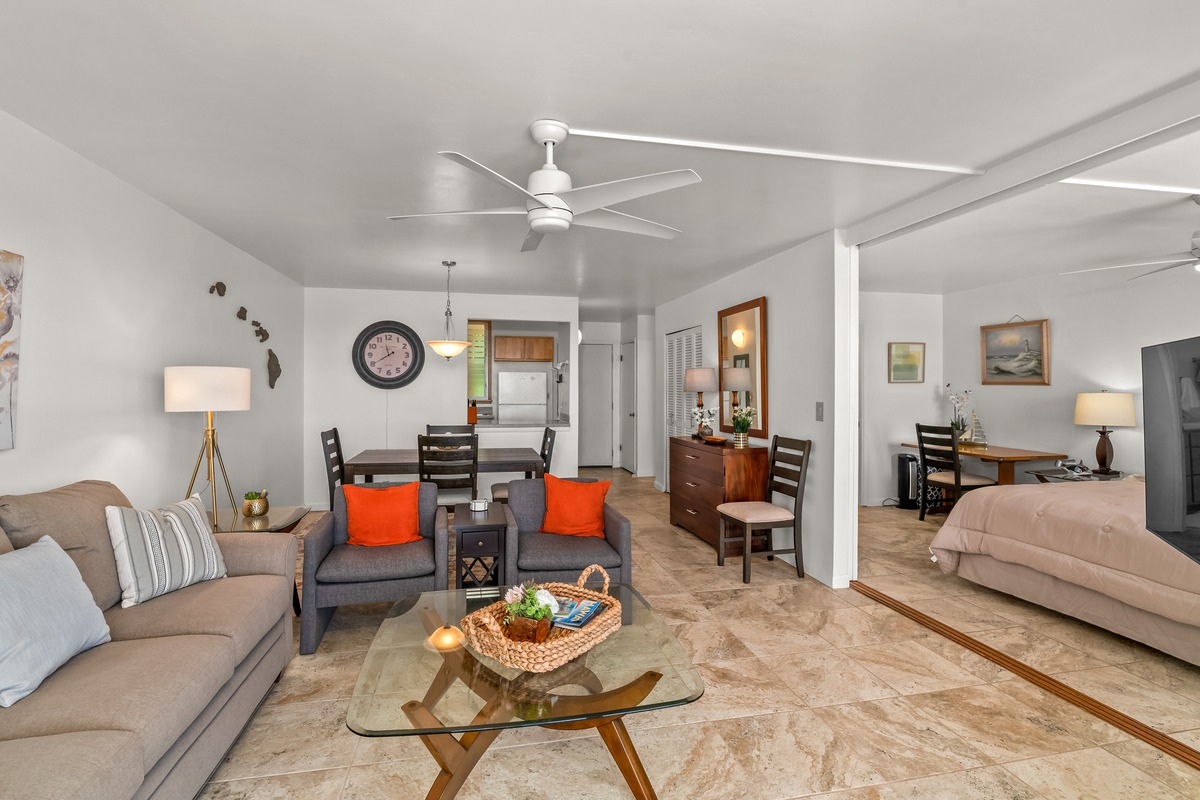 1763 Pe'e Road, Unit 404 Koloa, HI 96756 - Photo 13 of 18 a living room with furniture kitchen and a window