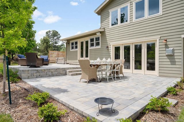 a view of a house with patio outdoor seating area