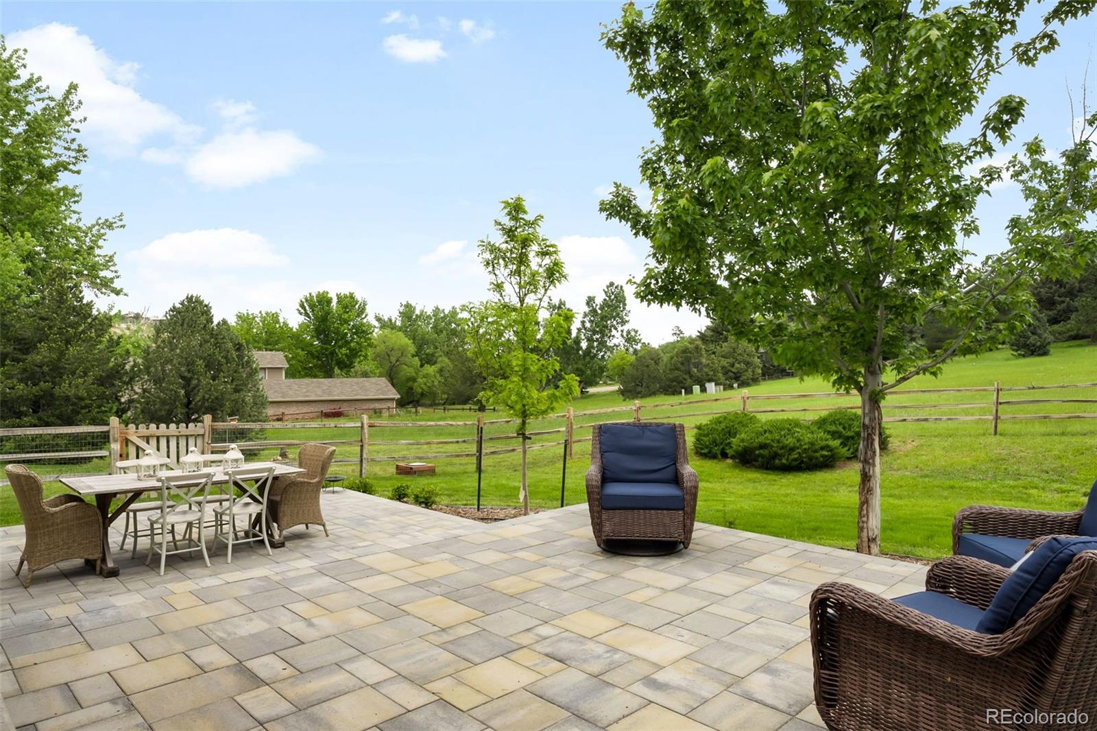 5586 Colorow Drive Morrison, CO 80465 - Photo 40 of 50 a view of a patio with a backyard