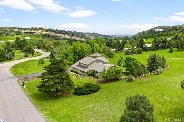 a view of a garden with an ocean