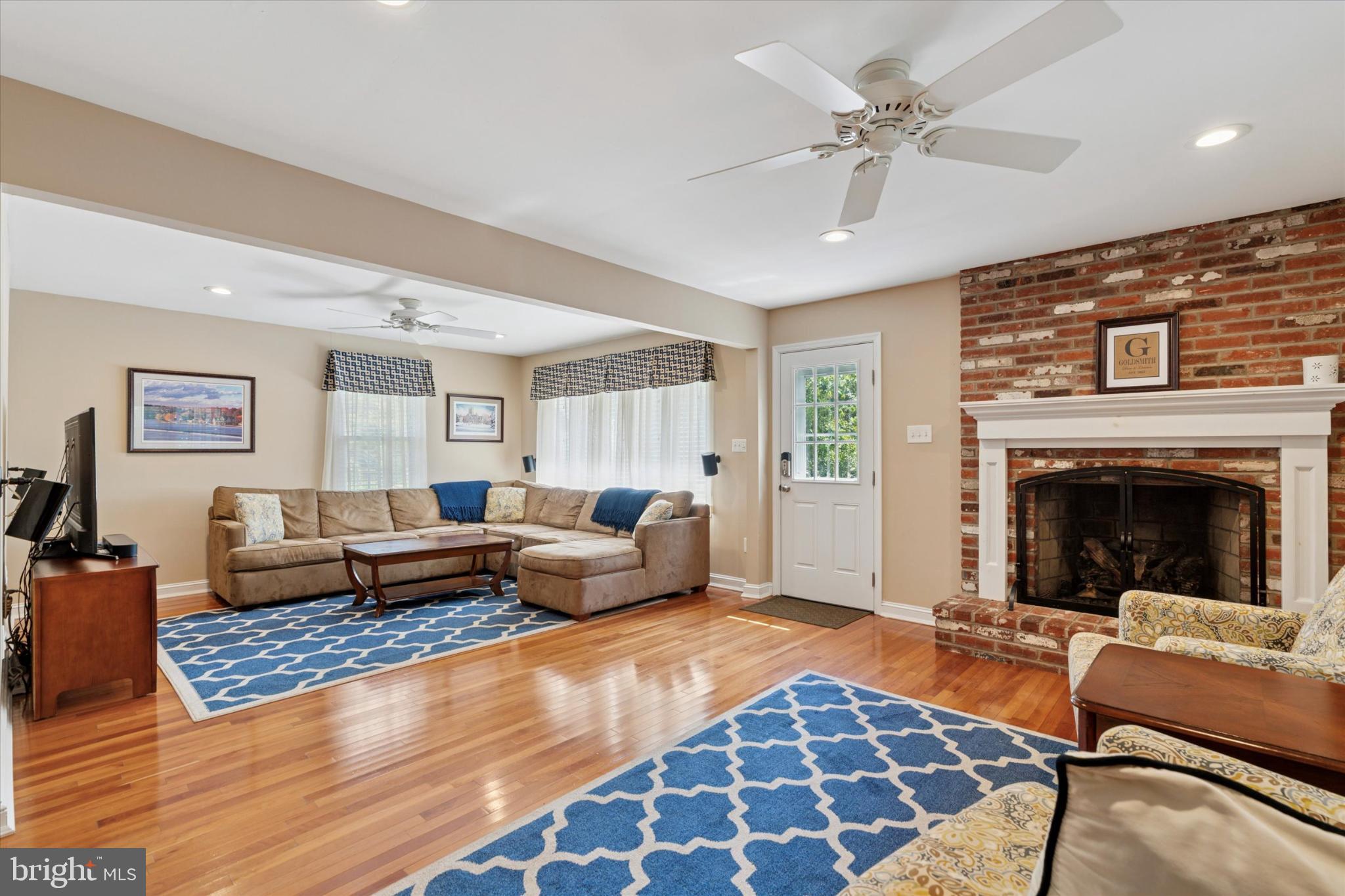 101 Rockland Road Havertown, PA 19083 - Photo 16 of 35 a living room with furniture and a fireplace