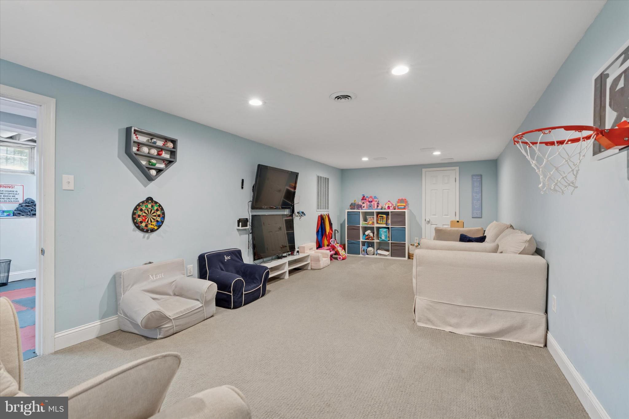 101 Rockland Road Havertown, PA 19083 - Photo 29 of 35 a living room with furniture and a flat screen tv