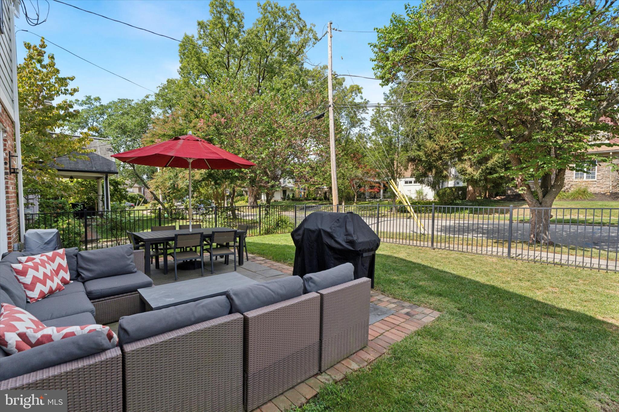 101 Rockland Road Havertown, PA 19083 - Photo 31 of 35 a backyard of a house with table and chairs