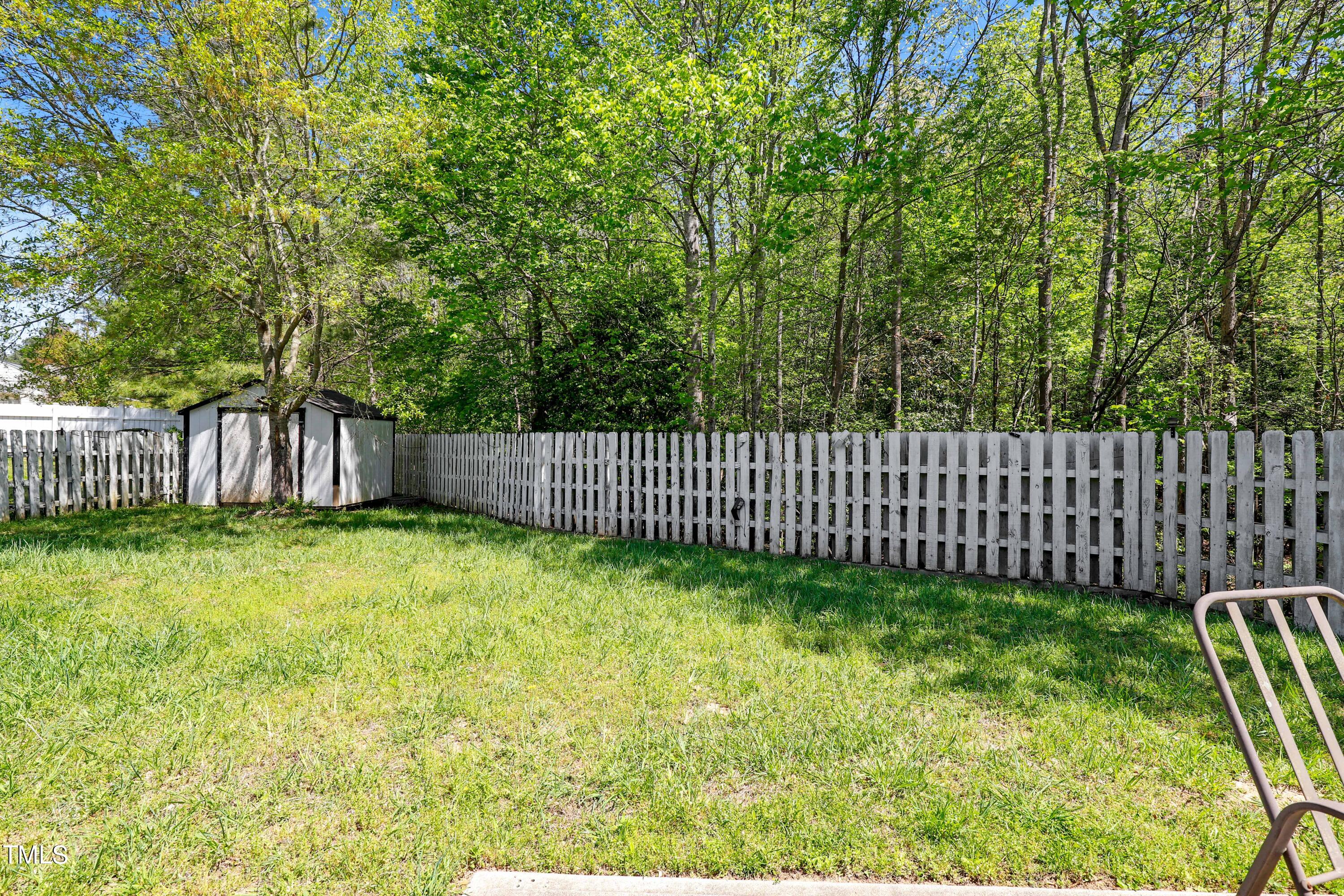 3809 Buck Ridge Court Raleigh, NC 27616 - Photo 8 of 10 a view of a backyard