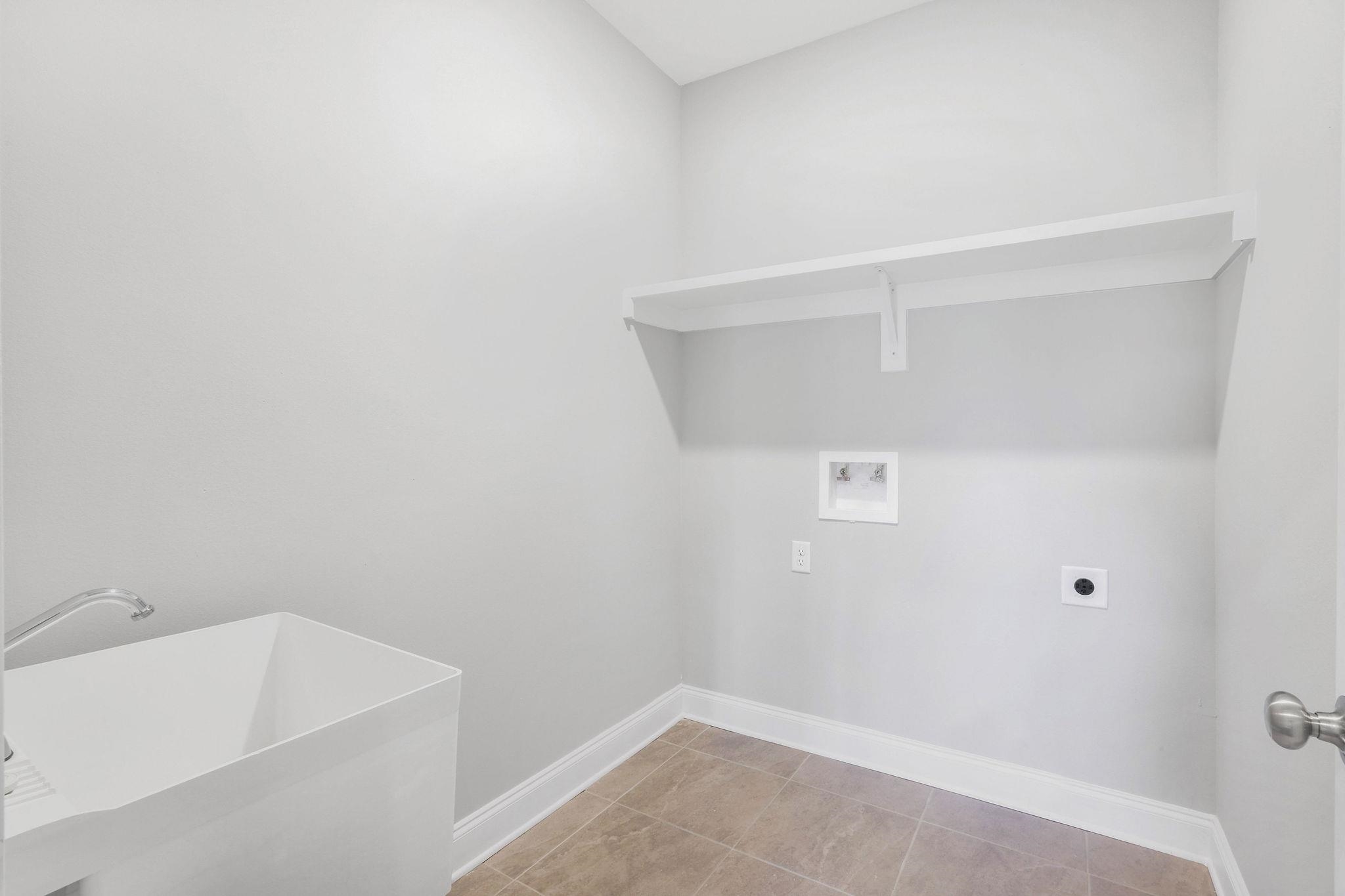 7781 Calverton Street Foley, AL 36535 - Photo 25 of 35 upgrade-laundry tub