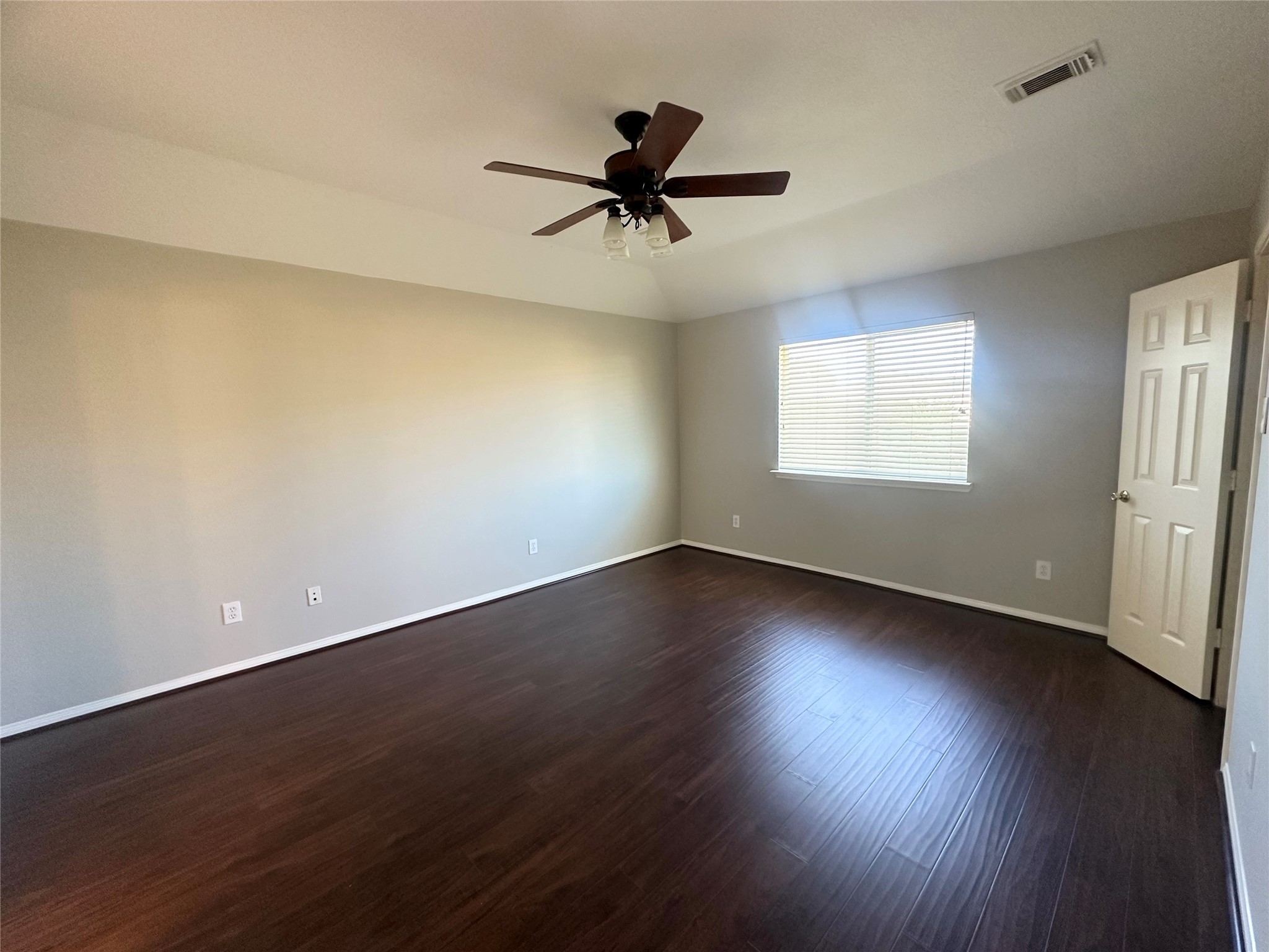 18822 Appletree Ridge Road Houston, TX 77084 - Photo 13 of 27 a view of empty room with wooden floor and fan