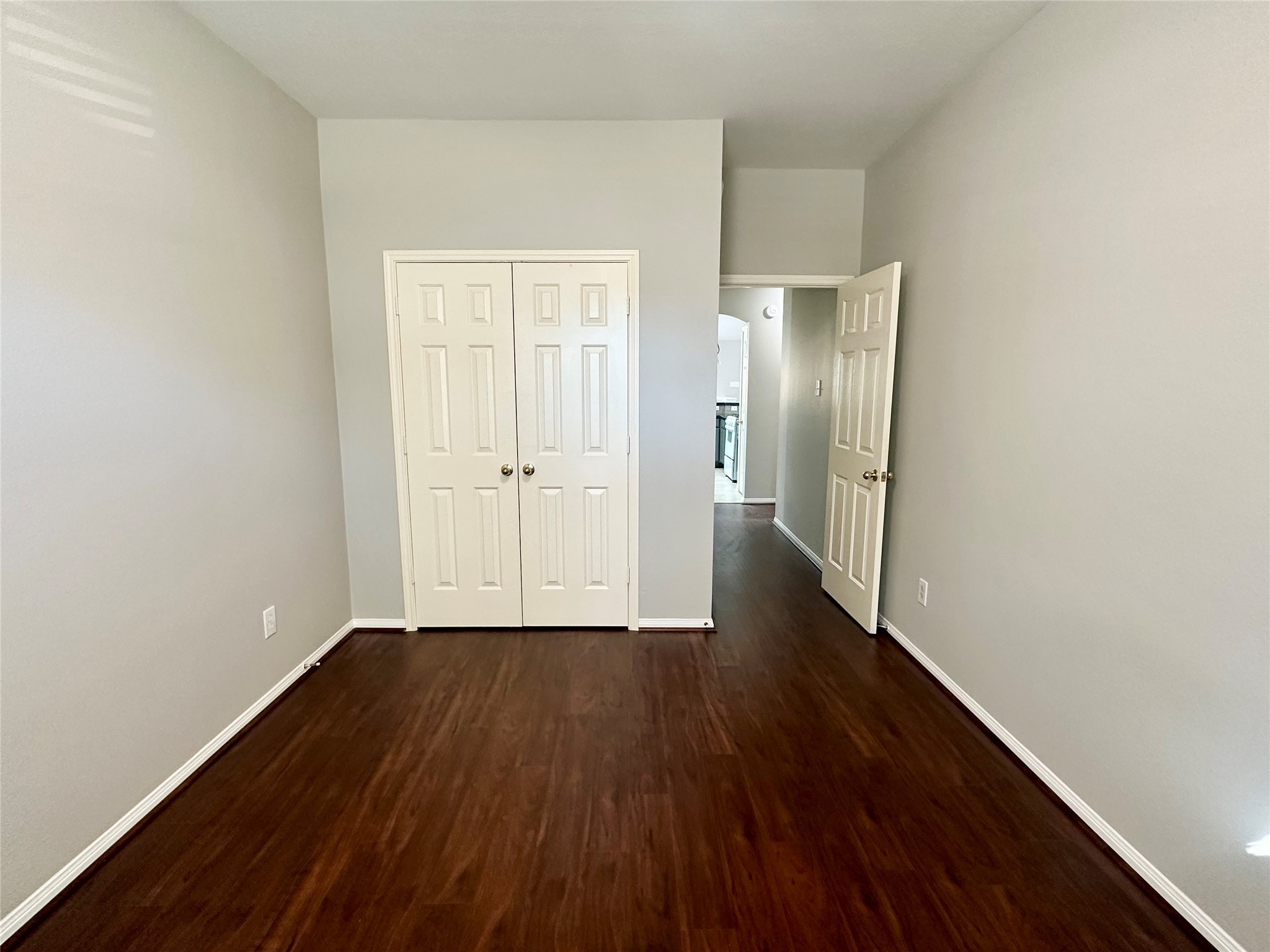18822 Appletree Ridge Road Houston, TX 77084 - Photo 19 of 27 a view of an empty room with wooden floor