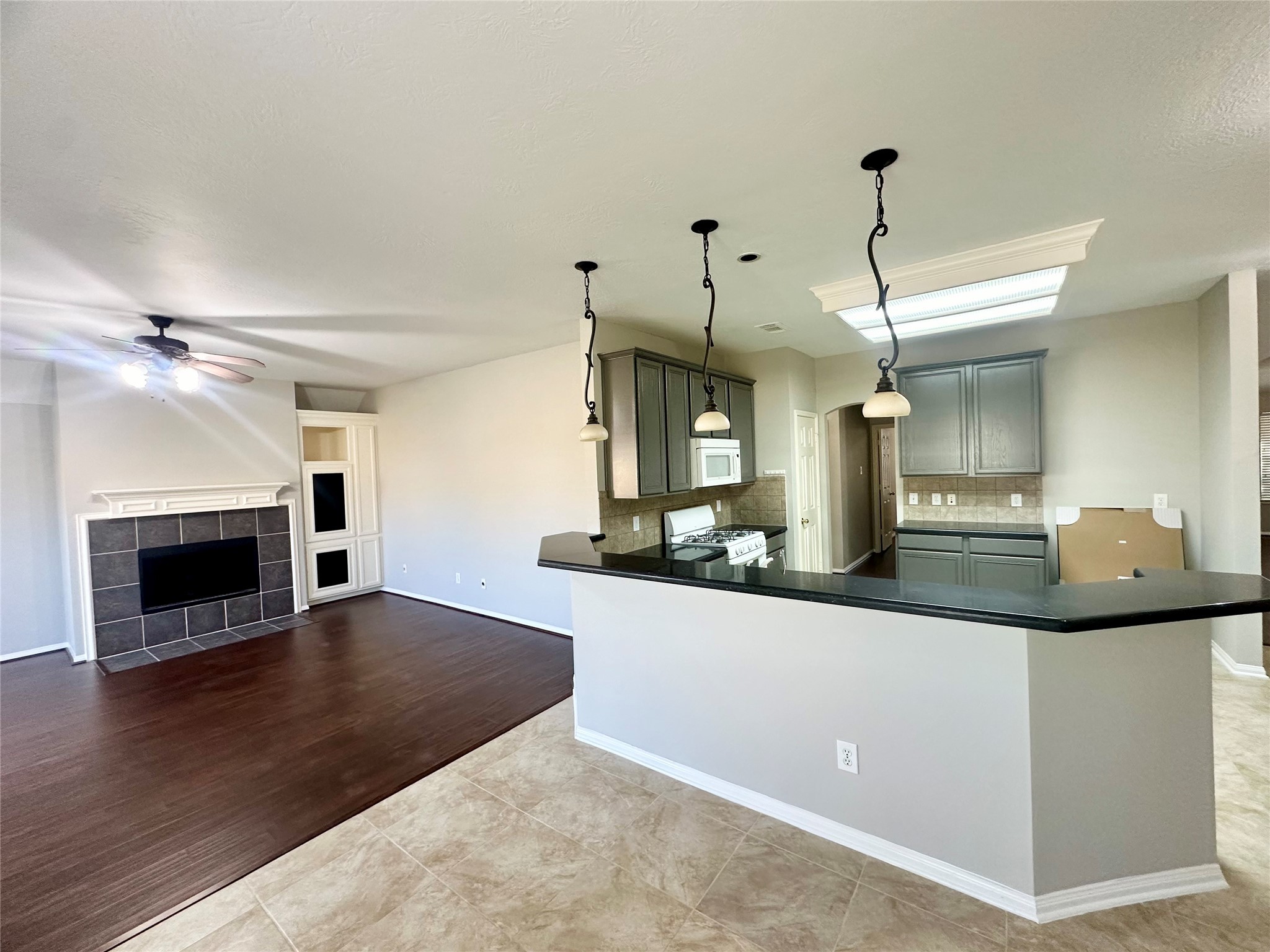 18822 Appletree Ridge Road Houston, TX 77084 - Photo 6 of 27 a kitchen with granite countertop a sink cabinets and stainless steel appliances