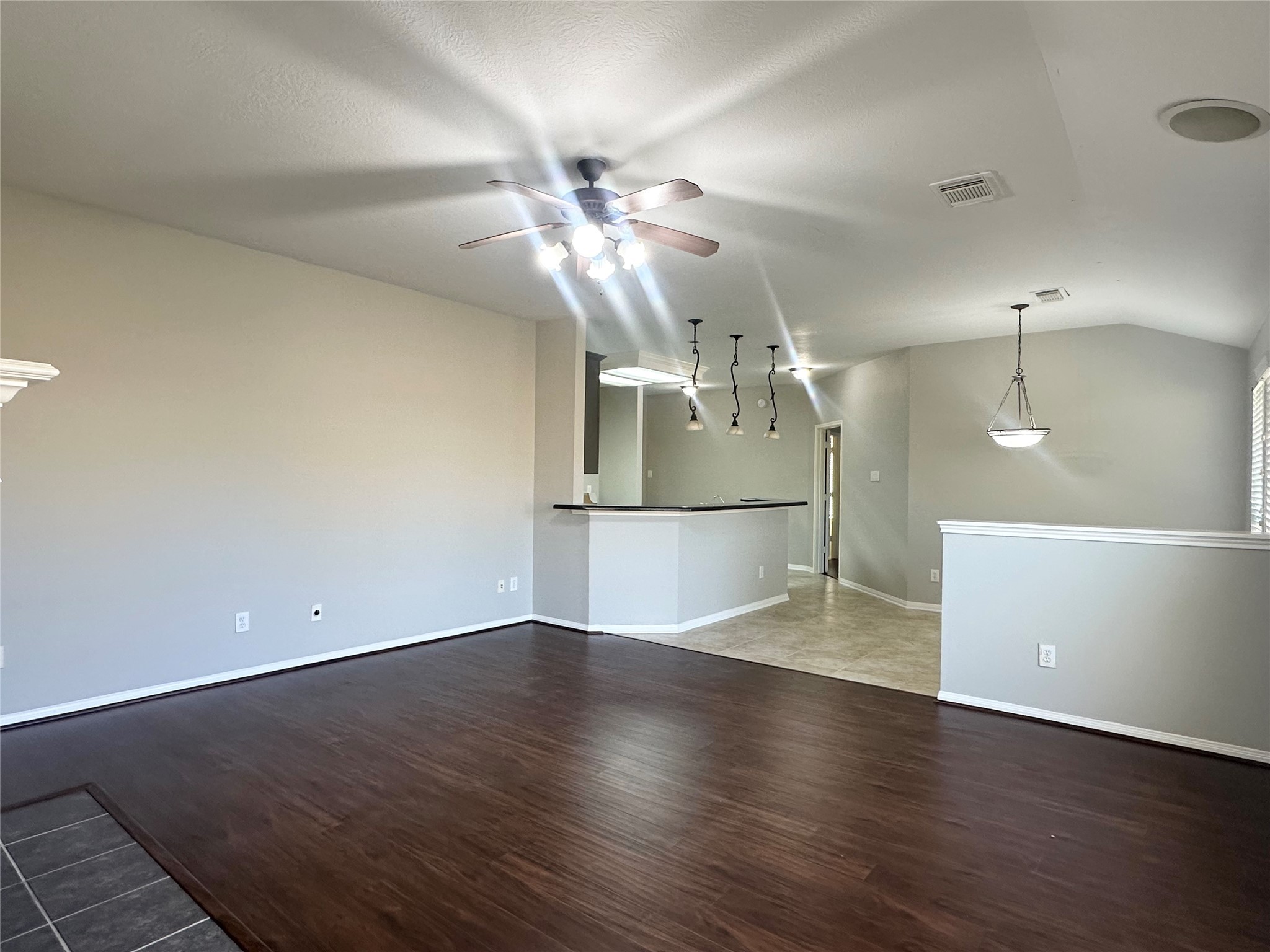 18822 Appletree Ridge Road Houston, TX 77084 - Photo 10 of 27 a view of empty room with wooden floor and fan
