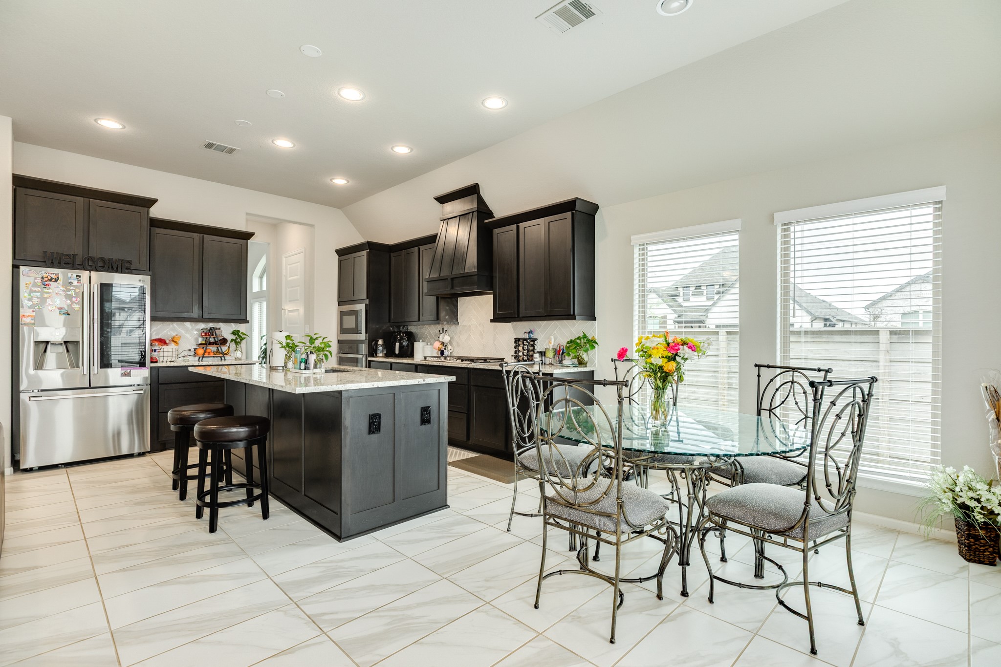 5138 Walnut Grv Lane Manvel, TX 77578 - Photo 12 of 43 a kitchen with counter space cabinets and appliances