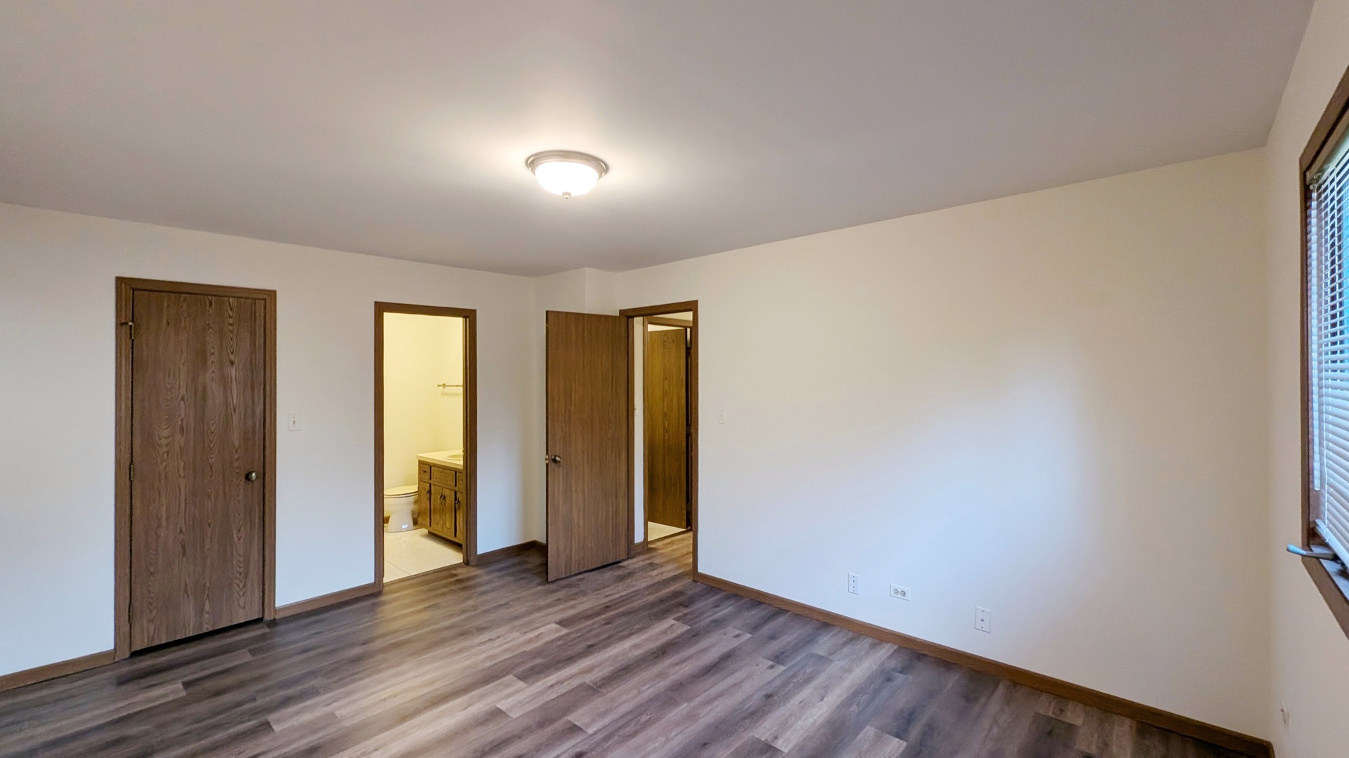 600 Crescenzo Court, Unit B New Lenox, IL 60451 - Photo 4 of 13 an empty room with wooden floor and closet