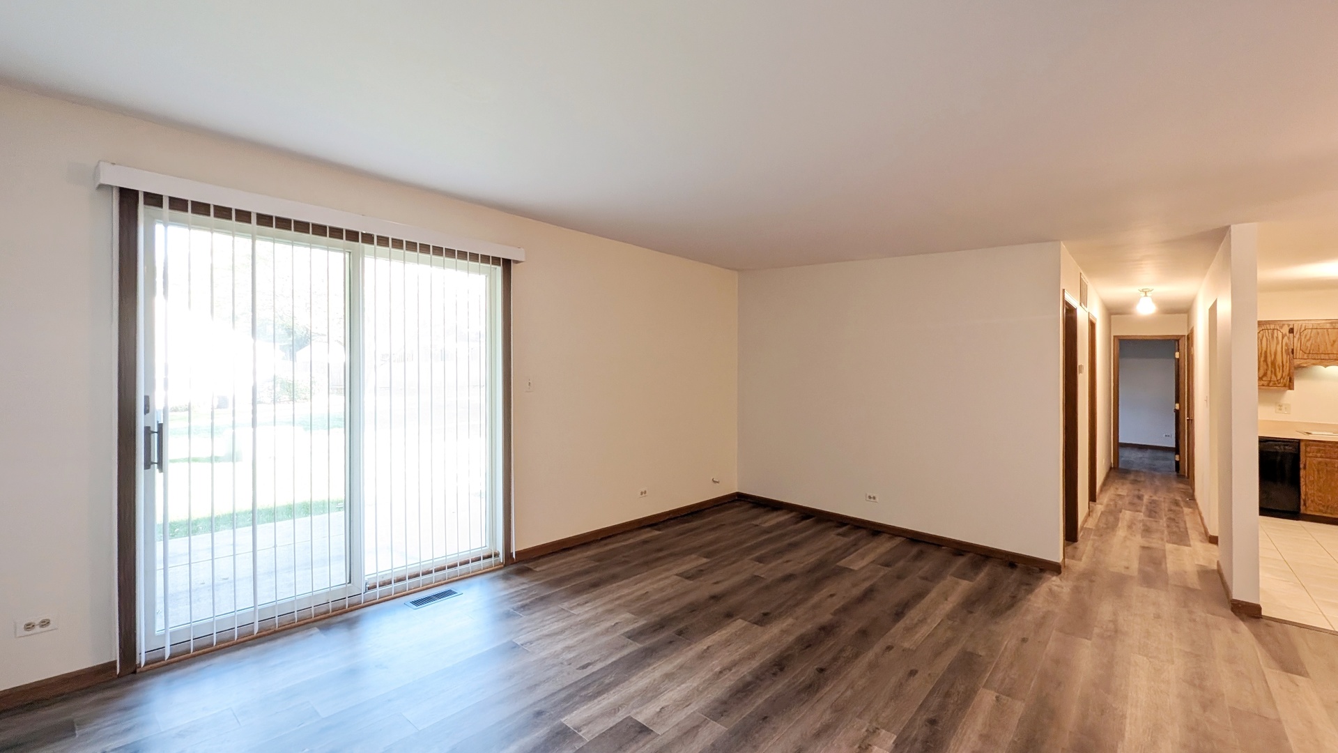 600 Crescenzo Court, Unit B New Lenox, IL 60451 - Photo 9 of 13 a view of empty room with wooden floor and fan