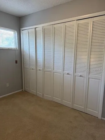 a view of a room with a window