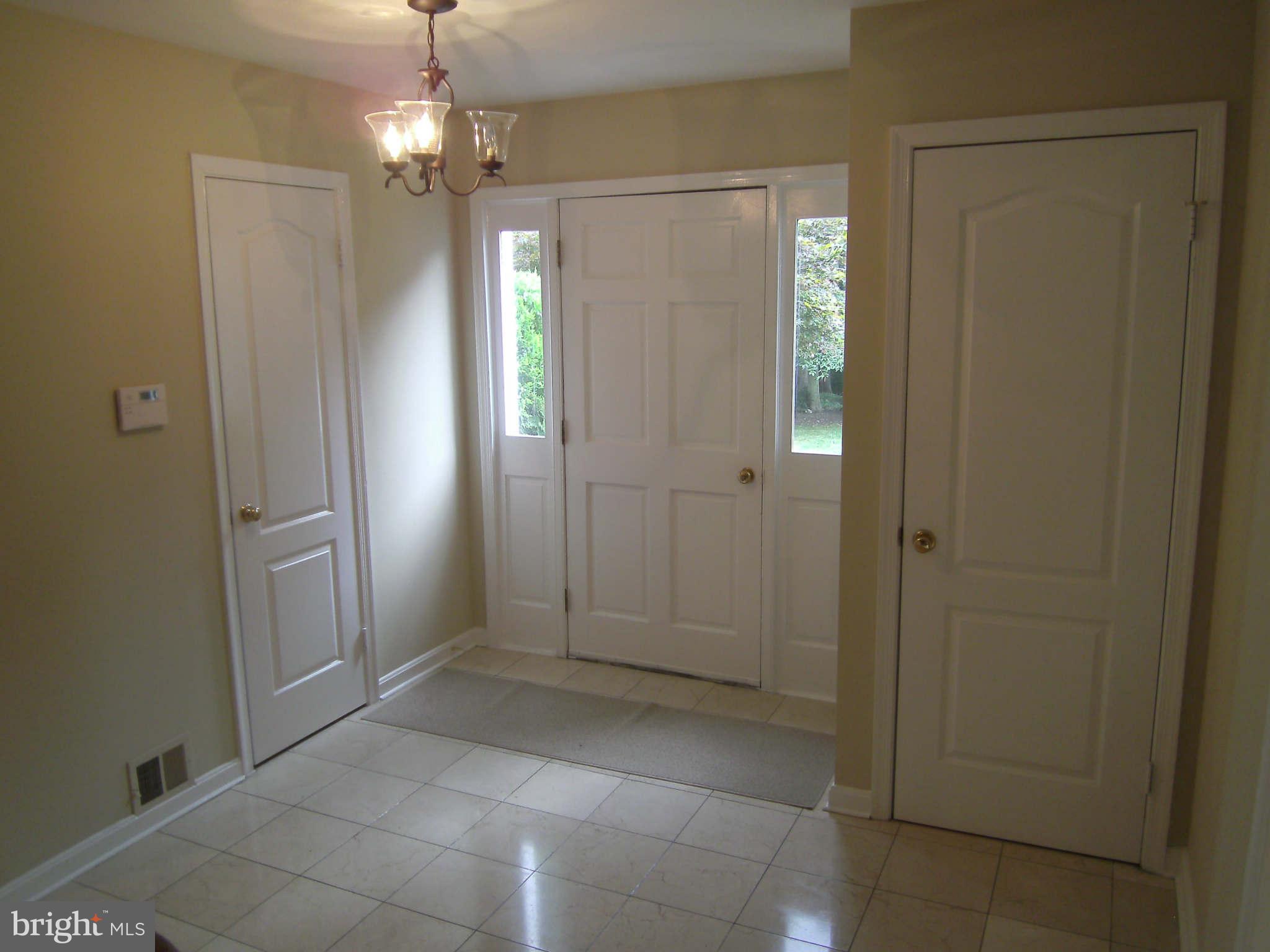 8662 Center Road Springfield, VA 22152 - Photo 2 of 23 a bathroom with a shower and a sink