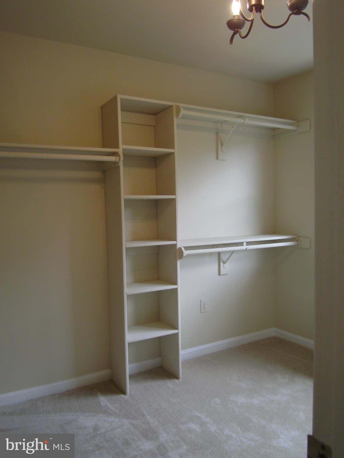 8662 Center Road Springfield, VA 22152 - Photo 9 of 23 a view of an empty walk in closet