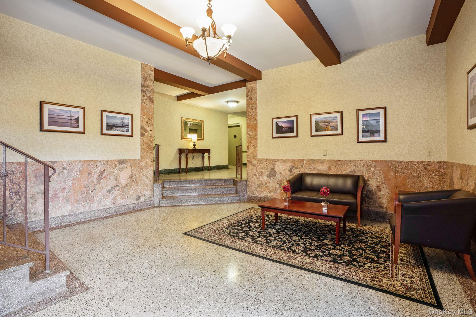 565 Broadway, Unit 1F Hastings-on-Hudson, NY 10706 - Photo 2 of 17 a living room with furniture and a rug