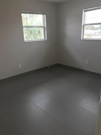 an empty room with a window