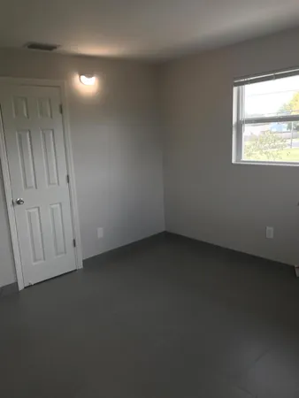 an empty room with a window