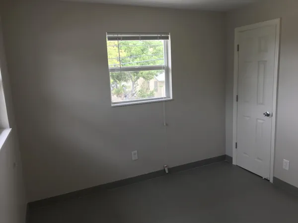 an empty room with a window