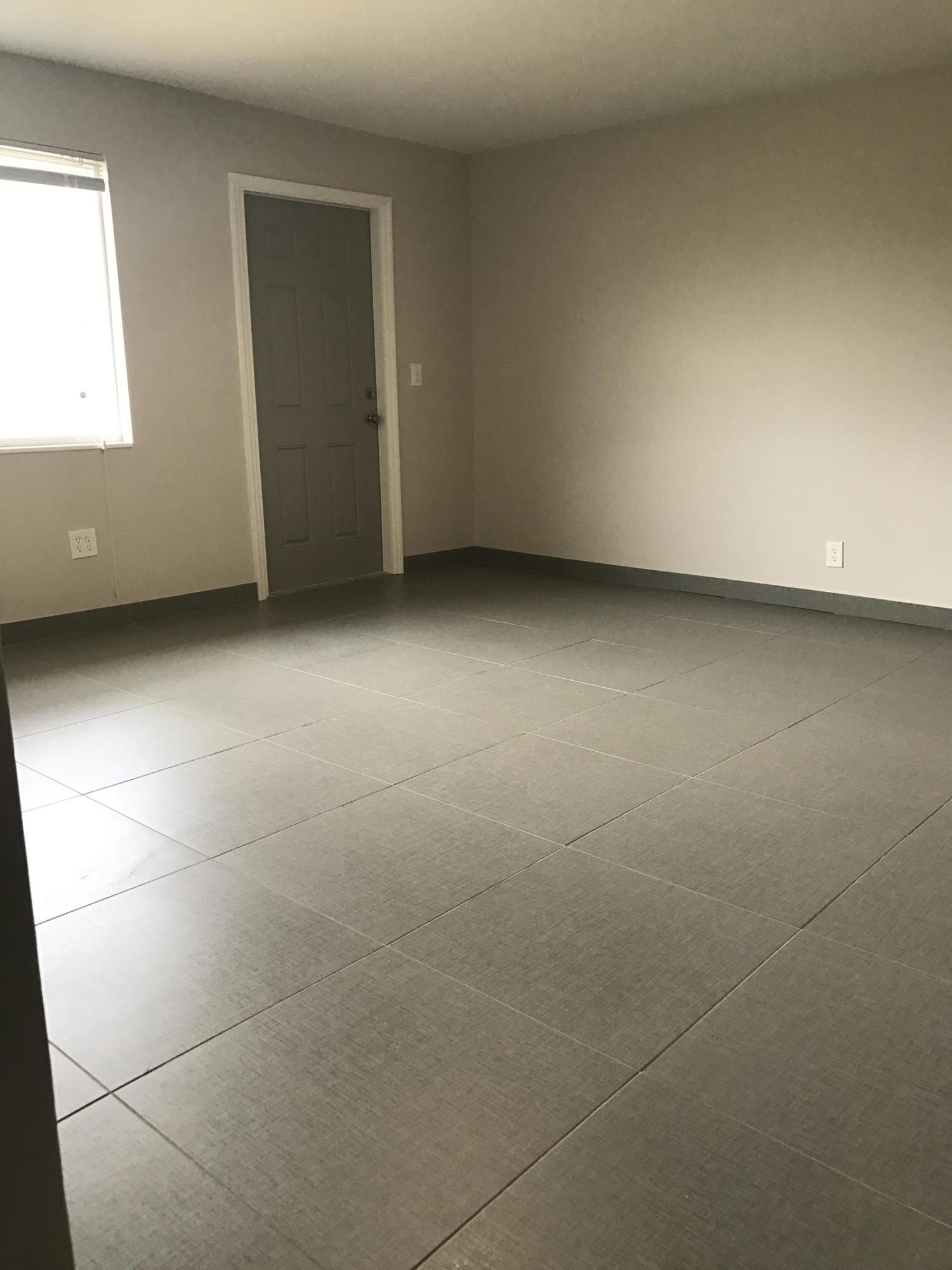 142 Southwest 8th Avenue, Unit B Delray Beach, FL 33444 - Photo 25 of 29 a view of an empty room and window