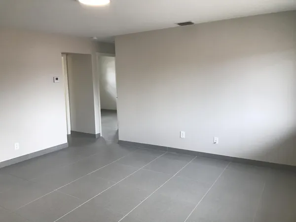 an empty room with a natural light