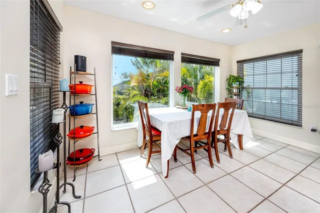 a kitchen with stainless steel appliances granite countertop a sink dishwasher stove and refrigerator