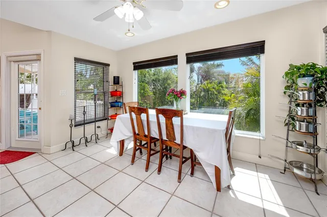 a kitchen with stainless steel appliances kitchen island granite countertop a sink and cabinets