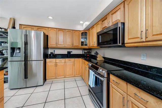 a view of a backyard with potted plants