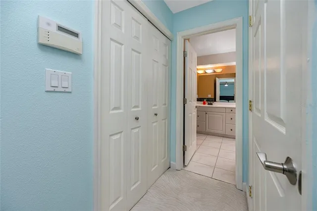 a view of an entryway with wooden floor and staircase