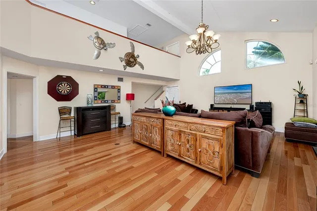 a view of a white house with a yard