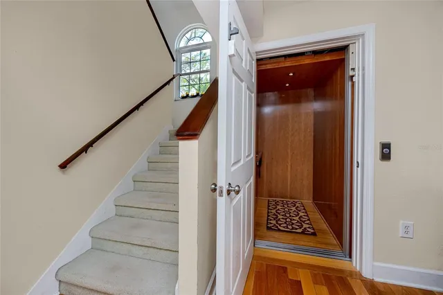a view of a balcony with plants