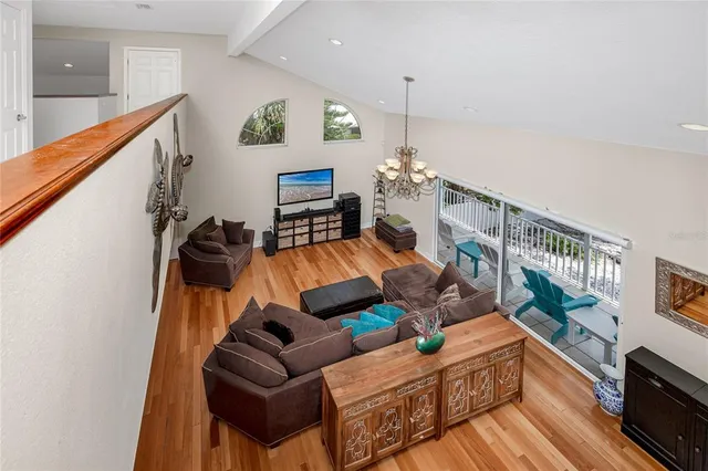 a bedroom with a bed and a table