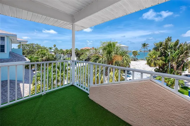 a potted plant in front of a house
