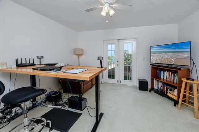 a view of a swimming pool with a yard