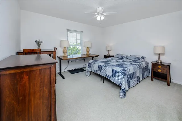 an aerial view of a house with a lake view