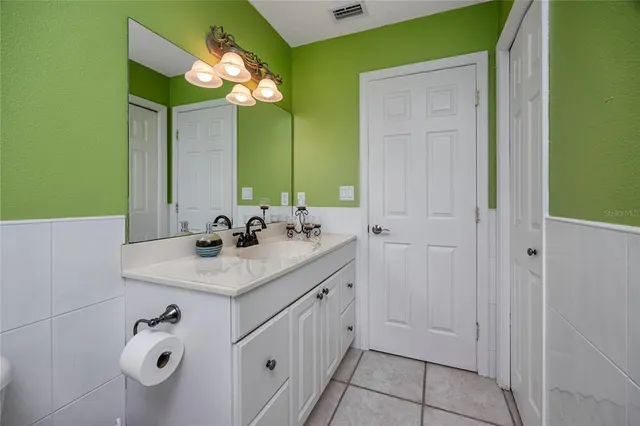 an aerial view of residential building and lake