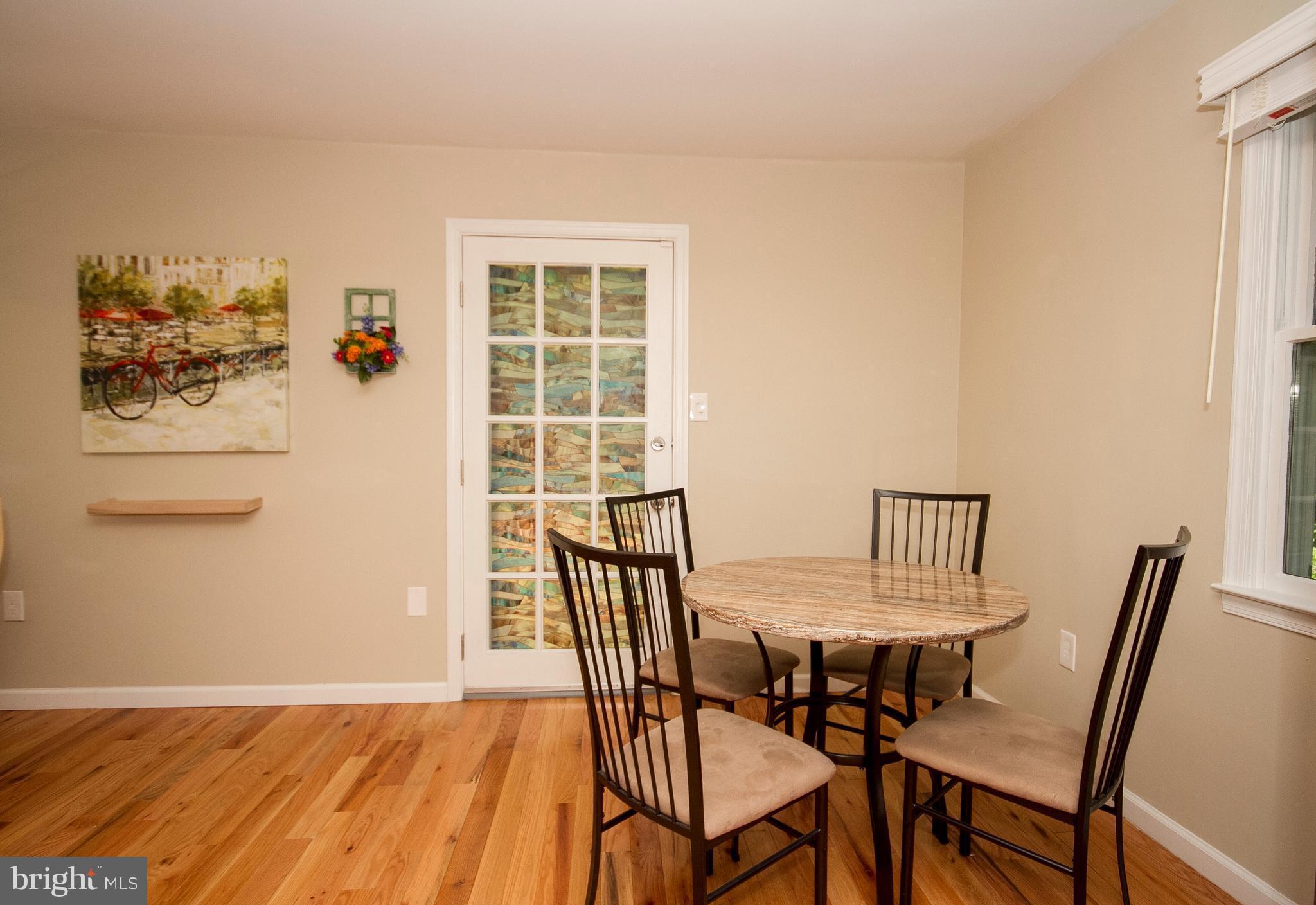 1618 Providence Road Towson, MD 21286 - Photo 11 of 30 a view of a dining room with furniture and wooden floor