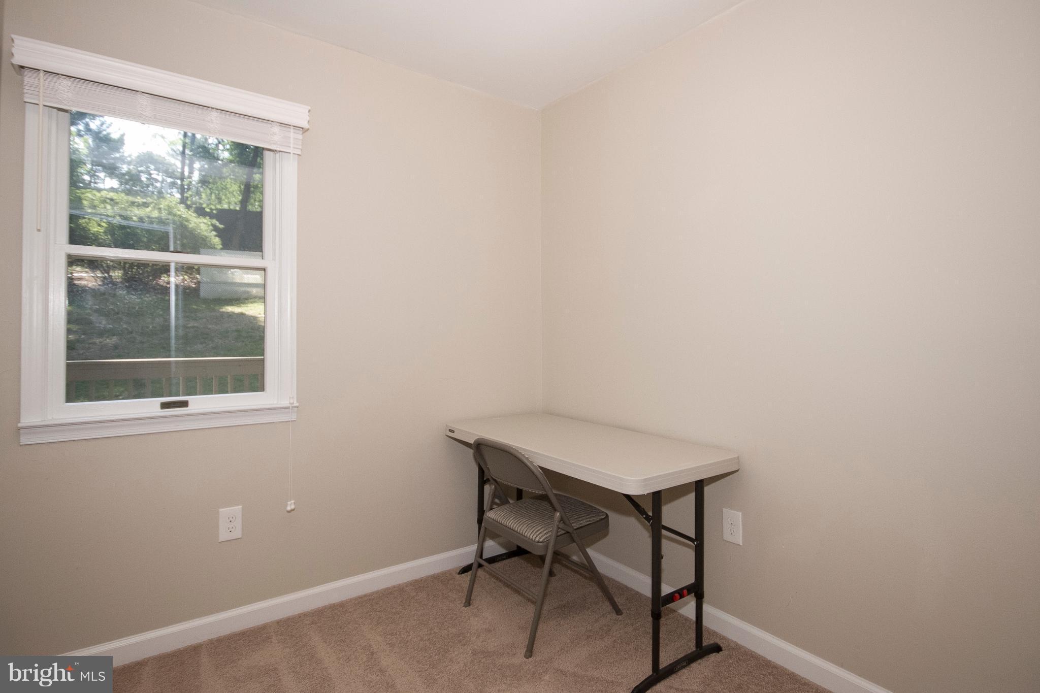 1618 Providence Road Towson, MD 21286 - Photo 18 of 30 a room with a table and a window