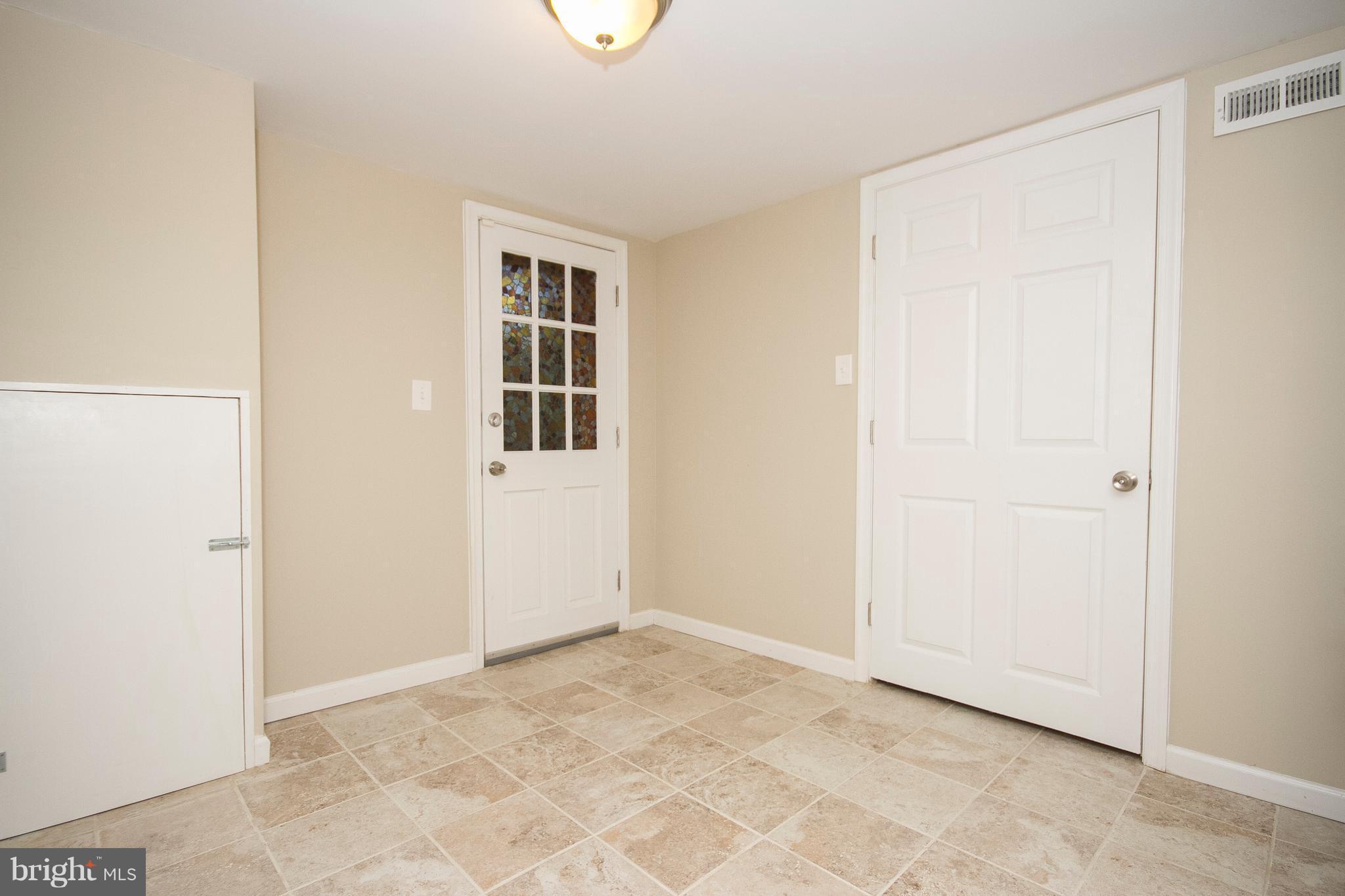1618 Providence Road Towson, MD 21286 - Photo 21 of 30 an empty room with windows