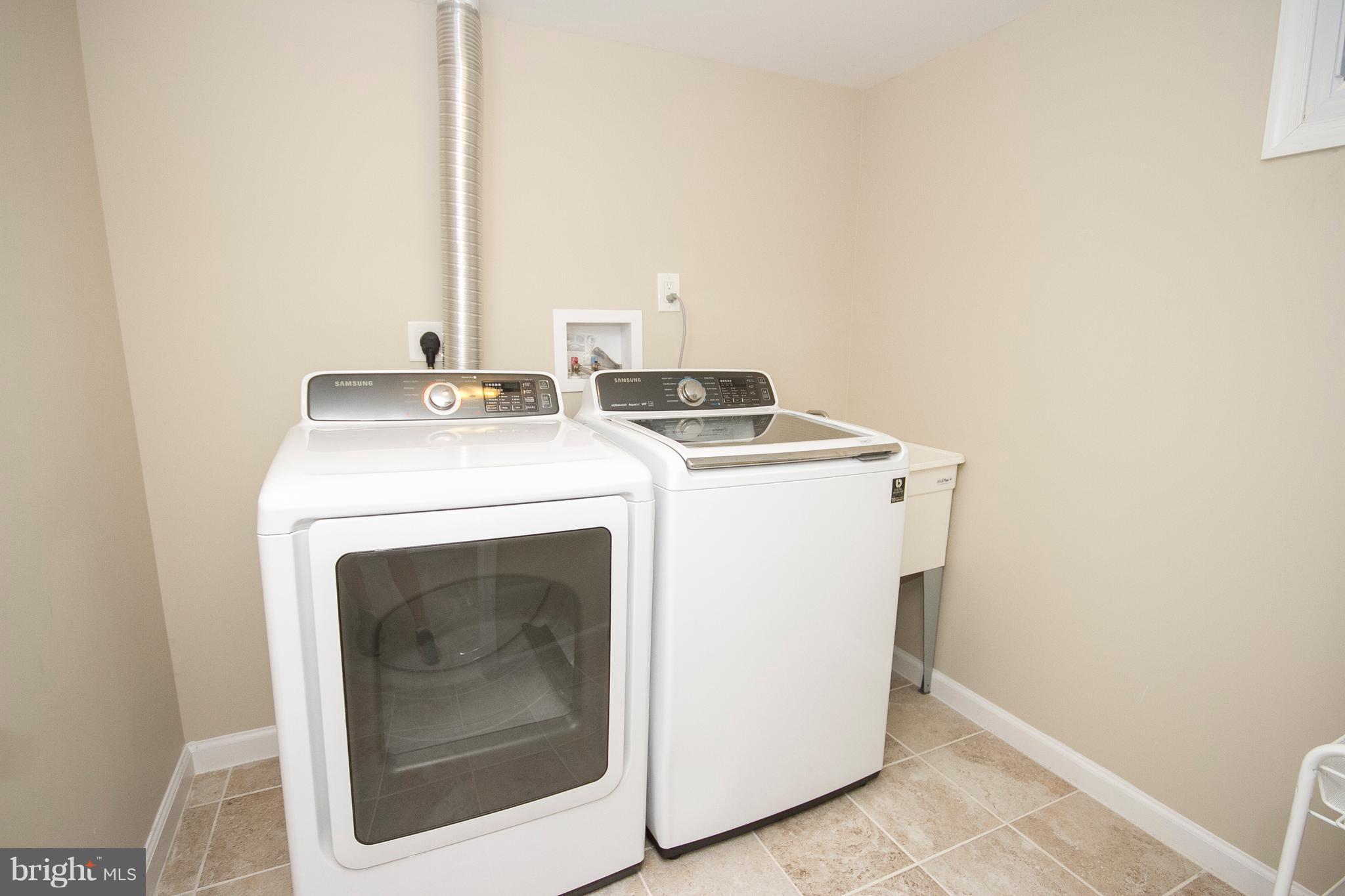 1618 Providence Road Towson, MD 21286 - Photo 22 of 30 a utility room with dryer and washer
