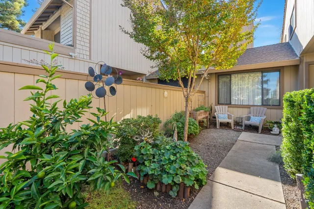 front view of a house with a garden