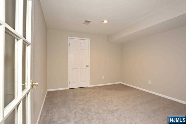 387 Green Mountain Road Mahwah, NJ 07430 - Photo 18 of 25 a view of an empty room