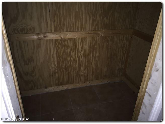 10319 Shellcracker Road Jacksonville, FL 32226 - Photo 5 of 10 a close view of wooden door