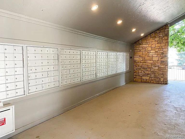 2575 South Syracuse Way, Unit D103 Denver, CO 80231 - Photo 9 of 10 a view of an empty room with windows