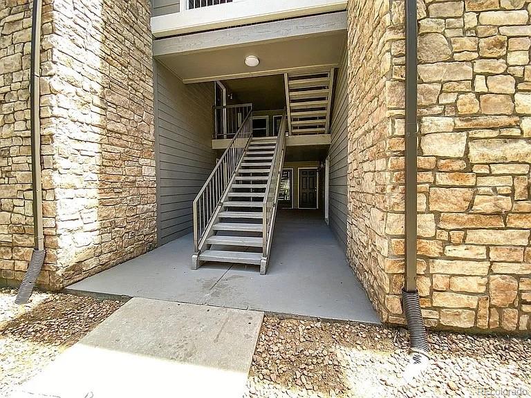 2575 South Syracuse Way, Unit D103 Denver, CO 80231 - Photo 10 of 10 a view of entryway with a front door