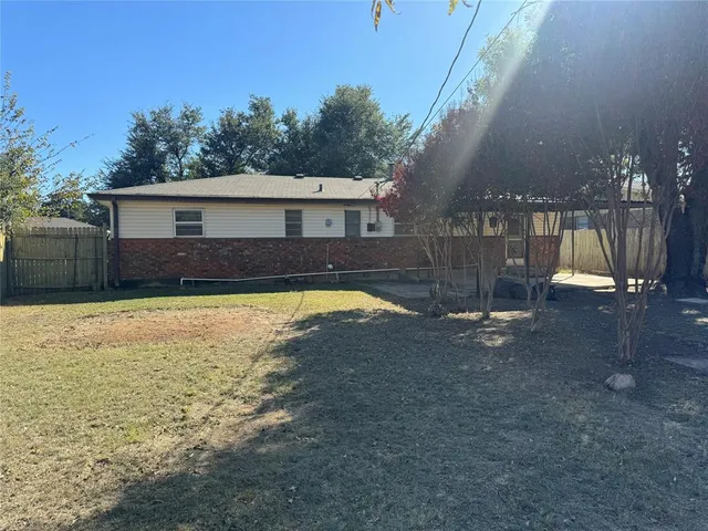 a view of a house with swimming pool