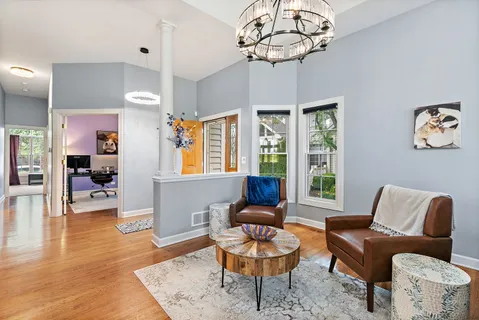 a living room with furniture or couch and a window