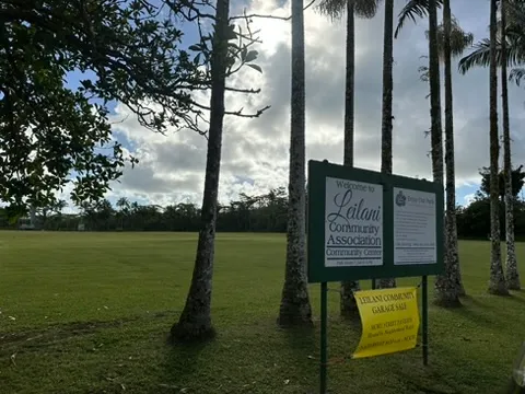 a view of a park with welcome board