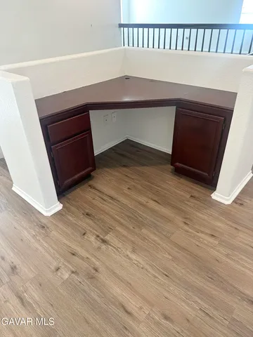 a living room with a wooden floor